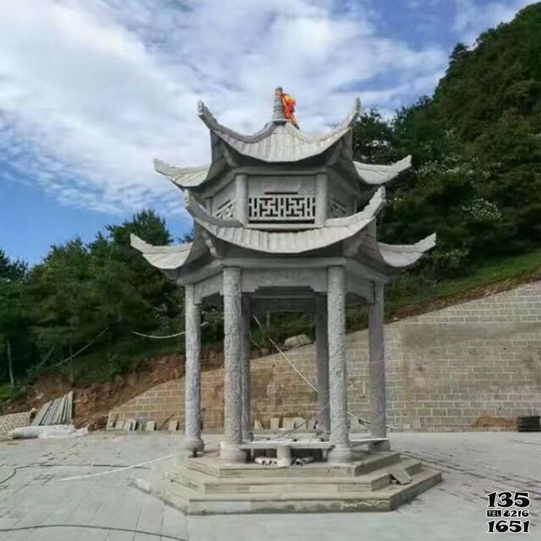 涼亭雕塑-山景區(qū)寺院戶外擺放青石雕刻鏤空六柱休閑涼亭雕塑高清圖片