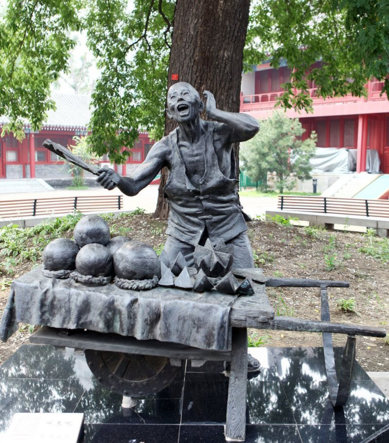 賣(mài)西瓜的人物銅雕-公園小品賣(mài)西瓜的人物銅雕高清圖片